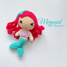 a crocheted little mermaid doll laying on top of a white surface with the words mermaid pdf pattern below it