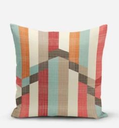 an orange, brown and blue striped pillow on a white background