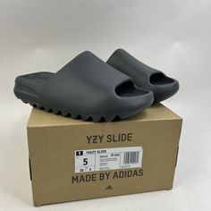 This Pair Is Brand New In Box! S They Are A 5 In Men’s, Which Is Equivalent To A 6 In Women’s! Please Check All Photos Before Purchasing! All Sales Are Final! No Refunds Or Returns! If You Have Any Questions About Sizing Please Feel Free To Send Me A Message! I Am Not Responsible For Factory Flaws On Mass Produced Pairs! All Items Ship The Day After Purchase Priority Mail & Double Boxed Unless The Order Is Placed On A Saturday! If You Purchase On Saturday Your Item Will Ship Out Monday Due To Th Adidas Slides With Rubber Sole For Streetwear, Gray Durable Sneakers For Streetwear, Wear-resistant Gray Sneakers For Streetwear, Gray Wear-resistant Sneakers For Streetwear, Adidas Casual Slides For Streetwear, Adidas Sporty Slides For Streetwear, Adidas Yeezy Slide, Yeezy Slides, Adidas Sneakers Women