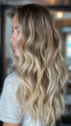 2024 Blonde Hair Trends: 30 Stunning Shades You Must Try Blonde No Roots, Blonde Hair Inspiration With Dark Roots, Blonde Highlights Grown Out, Growing Blonde Out, Soft Blonde Hair Dark Roots, Brown Roots With Blonde Hair Balayage, Blonde Hair Blended Roots, Light Blonde Hair With Dark Roots, Lived In Blonde Highlights