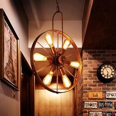 a light fixture hanging from the ceiling in a room with brick walls and wood paneling