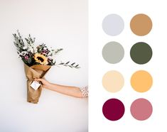 a person holding a bouquet of flowers with color swatches