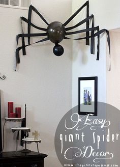 a living room decorated for halloween with spider decorations