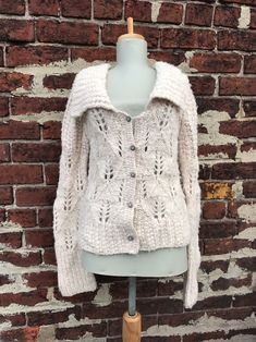 You're bidding on a beautiful Anthropologie cardigan by Handknit by Dollie.   Size medium Wool / acrylic Good, gently preloved condition! There is some overall piling, and the top button is loose, as pictured. This would be an easy fix, or it can be worn as is!         Check out my policies below, but please don't hesitate to ask any questions!        Payment • Please pay as soon as possible! After 4 days without payment, eBay will open an unpaid item case. If you need more time, just let m Winter Button-up Textured Knit Cardigan, Vintage Wool Hand-knitted Cardigan, Wool Button-up Cardigan With Button Closure, Long-sleeve Wool Textured Knit Cardigan, Long-sleeve Textured Cotton Cardigan, Anthropologie, Overalls, Hand Knitting, Wool