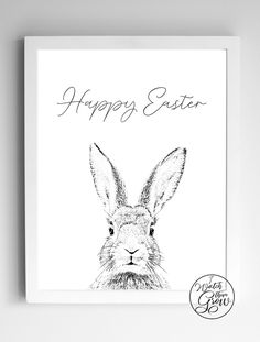 a black and white drawing of a rabbit with the words happy easter written on it