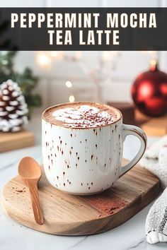 a cup of peppermint mocha tea latte on a wooden serving board