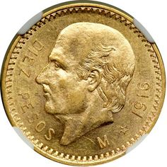 an old gold coin with a man's face on it