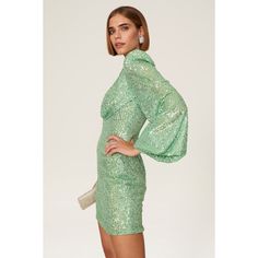 Light green sequins (100% Polyester). Sheath. V-neck. Long sleeves. Back zipper clousre. 32.5" from shoulder to hemline. Imported. Green V-neck Sequin Dress, Embellished Green Mini Dress For Party, Embellished Green Mini Dress For Party Season, Glamorous Green Mini Sequin Dress, Glamorous Green Mini Bodycon Dress, Glamorous Green Sequin Cocktail Dress, Glamorous Green Sequin Dress For Cocktail, Green Embellished Sequin Dress For Night Out, Green Sequined Mini Dress For Cocktail