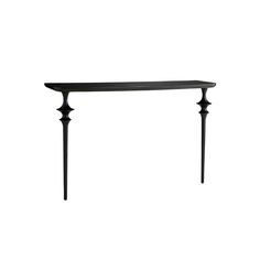 a black table with three legs on it