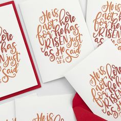 four different types of greeting cards with gold foil lettering on white paper and red envelopes