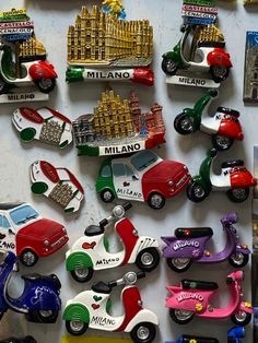 there are many toy cars on the wall