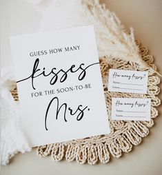 a card that says guess how many kisses for the soon - to - be mrs