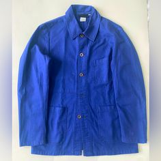 Lightly Used French Classic Workwear Jacket, Made In France. It’s As Authentic As The Vintage But More Brand New In Lightly Use Condition, Run Small, But Fit M Slim Body. Blue Relaxed Fit Outerwear With Welt Pockets, Blue Sport Coat With Pockets For Work, Blue Utility Jacket With Patch Pockets For Work, Blue Cotton Sport Coat With Lapel Collar, Blue Cotton Outerwear With Welt Pockets, Blue Blazer With Patch Pockets Long Sleeve, Blue Relaxed Fit Utility Jacket For Work, Blue Long Sleeve Blazer With Patch Pockets, Classic Blue Cotton Utility Jacket