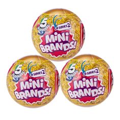 three lollipops with the words mini brands written on them in gold glitter