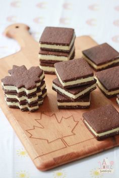 there are several pieces of cake on the cutting board