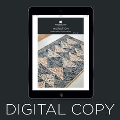 an ipad with the text digital copy on it, and a photo of a quilt