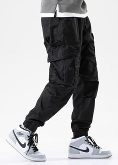 Elasticated drawstring waist Functional pockets Elasticated cuffs Tonal triple needle stitching Hammer loop Relaxed, tapered fit Carpenter details Cotton/poly STYLE NOTES Cargo pants have become increasingly popular over the last few seasons. And as streetwear continues to grow, these practical trousers are here to stay. Tactical inspired cargo pants are a must have in your rotation. Looser, tapered fits remain key with techwear styles reigning supreme. Pair with other streetwear-leaning staples Cuffed Cargo Pants Outfit Men, Oversized Cargo Pants Outfit Men, Outfit Oversize Hombre, Mens Cuffed Pants, Oversized Outfit Men, Cuffed Cargo Pants, Workwear Menswear, Street Style For Men, Cargo Pants Outfit Men