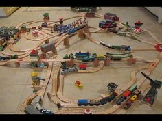 a toy train set is shown on the floor