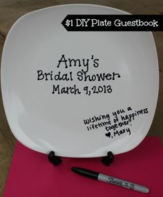 a white plate with writing on it and a marker next to it that says, army's bridal shower march 9, 2013