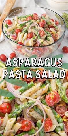 pasta salad with asparagus and tomatoes in a glass bowl on a white table