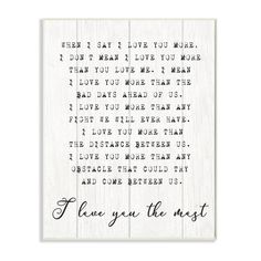 a white framed print with the words i love you the most