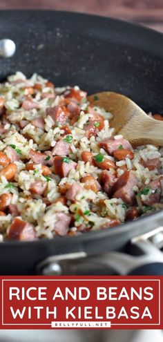 rice and beans with kielbasa in a skillet