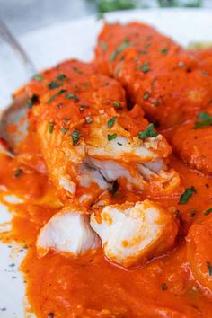 Savor this 30-minutes Spanish hake recipe with a rich, flavorful red pepper sauce for a taste of Spain!