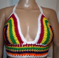 a crocheted halter top on a mannequin head