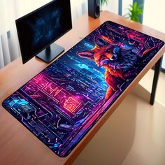 a computer desk with a mouse pad on it