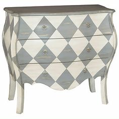 a white and grey checkered dresser with drawers