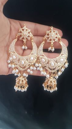 hydrabadi/punjabi Jaddau pearls Chandbalis in gold finish. The gorgeous earrings are lightweight and easy to wear with push back. Almost length of 3.5 inches makes it statement piece but the lightweight makes it easier to wear Chandbalis Earrings, Punjabi Jewelry, Classic Jewelry Pieces, Wedding Jewelery, Wife Material, Indian Jewelry Sets, Fancy Jewellery, Nov 6, Classic Jewelry