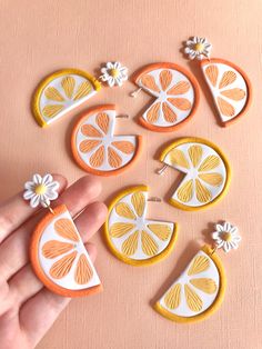 Handmade citrus slice earrings, lemon and orange. Ideal for summer or for adding extra cuteness to any outfit. These statement earrings are made from polymer clay and very lightweight. Tropical vibes. | Lemon Or Orange Slice Daisy Earrings, Fruit Jewelry, Summer Earrings, Clay Earrings, Citrus Jewelry, Cute Summer Jewelry, Tropical Earring Cute Summer Jewelry, Diy Earrings Polymer Clay, Polymer Clay Jewelry Tutorials, Orange Slice, Handmade Clay Jewelry, Fruit Jewelry, Jewelry Cute, Polymer Earrings, Polymer Clay Diy