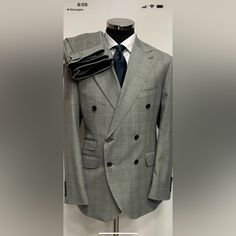 Stunning Grey Glen Plaid Super 150 Cerruti Double Breasted Peak Lapel Wool Suit. Made In Italy. Double Vents 5 Inch Wide Peak Lapel, Hand Stitched Soft Neapolitan Shoulder Ticket Pocket Flat Front Pant With Side Buckle Light Weight Wool Fabric You Will Not Find A Suit This Quality, Style Finish At This Price Anywhere. This Suit Will Exceed Your Expectation. Designer Custom Fit Business Suits, Royal Blue Blazer Men, Luxury Double Breasted Suit For Formal Occasions, Luxury Custom Fit Three-piece Suit, Luxury Double Breasted Suit With Notch Lapel, Luxury Custom Fit Double Breasted Suit, Luxury Double Breasted Suit For Semi-formal Occasions, Luxury Double Breasted Suit, Luxury Tailored Double Breasted Suit