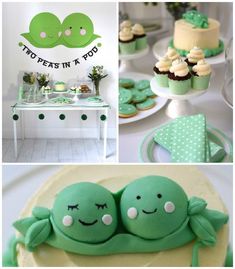 two peas are sitting on top of each other in front of some cupcakes