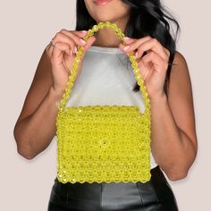 "Enhancing outfits one bead bag at a time 🧿 A fashionable beaded handbag handcrafted and individually woven with hundreds of beads to make the perfect handbag. Each bag can take hours to complete. Details: One top/shoulder handle  Open top Spot clean Each bag comes with a storage bag. Made with Non-toxic Polystyrene Plastic (Made in the USA) Magnetic Clasp Closure Handmade by me in The Bay Area, CA.  Size:  Width 7\" Side Width. 2.5\" Body Height: 6\" Top Handle Drop: 6.75\" Mini bags can snuggly fit an iPhone 11 Pro w/o a case. Due to Mini sizing, ideally, a mini bags can fit credit cards, lip glosses, and an iPhone smaller than iPhone 11 pro." Trendy Beaded Shoulder Bag For Spring, Trendy Spring Beaded Shoulder Bag, Trendy Beaded Bags For Spring, Summer Beaded Bags As Fashion Accessory, Summer Beaded Bag Fashion Accessory, Handheld Beaded Bags For Spring, Summer Fashion Beaded Bag, Summer Beaded Shoulder Bag For Shopping, Summer Embellished Rectangular Bag