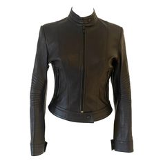 Very UNIQUE item this JEAN CLAUDE JITROIS vintage (excellent condition, never worn) black leather ribbed MOTO BIKE JACKET from the 90s. Snap button collar. Zip front. Ribbed detailing at elbow. Jean-Claude Jitrois is a French fashion designer known for his work with leather. He is particularly renowned for his leather creations, including jackets. Fitted Moto Biker Jacket, Fitted Moto Leather Jacket For Biker Events, Fitted Moto Leather Jacket For Motorcycling, Fitted Cafe Racer Biker Jacket For Motorcycling, Fitted Moto Biker Jacket For Motorcycling, Fitted Biker Jacket For Motorcycling, Fitted Leather Cafe Racer Jacket, Fitted Cafe Racer Leather Jacket, Classic Fitted Biker Jacket For Biker Events