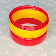 RED Bangle, 80s Bangle, Yellow Bangle, Vintage Bangles Set, Plastic Vintage Bangle, Bangle Set of 4, Eighties Bangle 1980's Round plastic Bangles Measurement: Internal diameter 65 mm 1 x Red 2.0. cm 2 x Yellow 2.0 cm 2 x Red 0.5 cm *Price is for 4(four) bangles Red Bangles, Plastic Bangles, Fruit Jewelry, Bangles Set, Vintage Bangles, Circle Time, Juicy Fruit, Retro Jewelry, Bangle Set