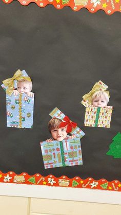 a bulletin board with pictures of babies in presents on it and christmas decorations around the edges