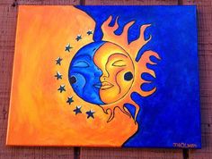 a painting of the sun and moon on a wooden surface