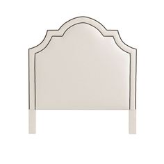 a white headboard with black trim on the top and bottom panel, in an elegant style