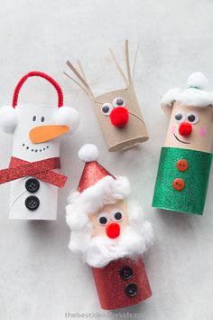 paper roll christmas crafts for kids with santa and snowmen on them, made from toilet rolls