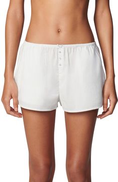 Love to lounge in these breezy stretch-cotton shorts covered in subtle stripes and fronted with a dainty bow. 1" inseam; 13 1/2" leg opening; 10 1/2" front rise; 13 1/2" back rise Elastic waist 95% cotton, 5% spandex Machine wash, tumble dry Imported Cotton Lounging Shorts With Drawstring, Summer Striped Relaxed Fit Pajama Shorts, Striped Relaxed Fit Pajama Shorts, Striped Shorts With Built-in Shorts For Loungewear, Striped Pajama Shorts With Built-in Shorts, Striped Shorts, Cotton Shorts, Stretch Cotton, Elastic Waist