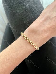 "YES! It's a REAL, 14K YELLOW GOLD bracelet.  Unlike many other listings, we sell exactly what is stated in our titles and descriptions. 14K Gold Oval Rolo Link Bracelet, 7.50\" Inch, 6.2mm Thick, Real Gold Bracelet,  Rolo Gold Bracelet, Women Gold Bracelet Matching necklace available https://www.etsy.com/listing/836984657 High quality, elegant and shiny Oval Link Bracelet. Crafted from guaranteed 100% 14K Gold.  Width: 6.2 MM    Length: 7.50\"   Weight : 5.80 Gram Closure: Lobster Claw Metal: 1 Yellow Gold Oval Link Tennis Bracelet, Classic Oval Cable Chain Bracelets, Elegant Oval Bracelet With Rolo Chain, Elegant Oval Bracelets With Rolo Chain, Elegant Oval Rolo Chain Bracelet, Gift Tennis Bracelet With Oval Links, Oval Cable Chain Bracelet, Oval Polished Finish Chain Bracelet As Gift, Oval Polished Chain Bracelet As Gift