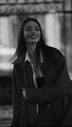 black and white photograph of a woman smiling