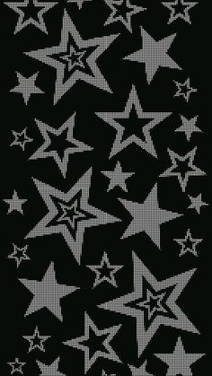 a black and white pattern with stars on the bottom, in different sizes and colors