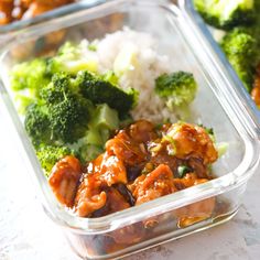 two plastic containers filled with food on top of a white tablecloth covered table next to broccoli and rice