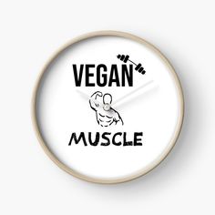 a clock with the words vegan muscle on it