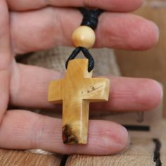 Wood Christian Cross This pendant is made of wood Boxwood. This one of a kind wood Boxwood cross necklace has been handmade from a carefully chosen piece of wood. The length of the cord is about 25 inches, but it can be regulated by the movable knot. Materials utilized: Wood Boxwood, coated cotton cord Production method 100% hand made by natural materials. I am always happy to discuss custom orders! Please feel free to contact me with any questions or requests. All pieces are created by hand so Brown Cross Pendant Necklace As Gift, Adjustable Wooden Beads Cross Jewelry, Brown Cross Pendant Necklace For Gift, Spiritual Natural Wood Necklaces As Gift, Spiritual Natural Wood Necklaces For Gifts, Brown Crucifix Cross Necklace As Gift, Natural Wood Spiritual Necklaces For Gifts, Mens Wooden Cross Necklace, Wooden Cross Necklace