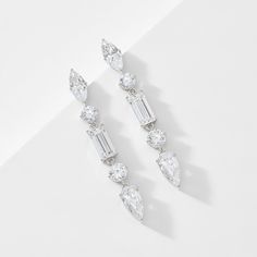 These earrings feature a mix of pear, round, and baguette CZ stones for a look that's elegant and edgy. The long linear look will have you dazzling in sparkle. Modern Cubic Zirconia Linear Earrings For Wedding, Edgy Jewelry, Final Touch, Cz Stone, Art Sketchbook, Jewelry Inspiration, Gold Earrings, Diamond Earrings, Cubic Zirconia