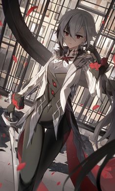 an anime character standing in front of a cage